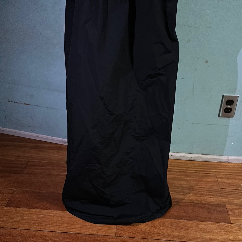 Black Leonard bodice dress by Christopher Esber